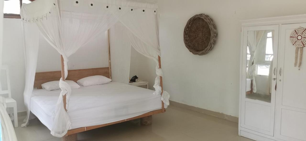 The Village Rua Beach Homestay Exterior foto